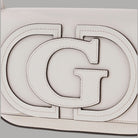 Borsa a spalla Guess Ruby nera con patta e tracolla a catena