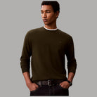 Calvin Klein maglione in lana merino verde con logo ricamato fronte