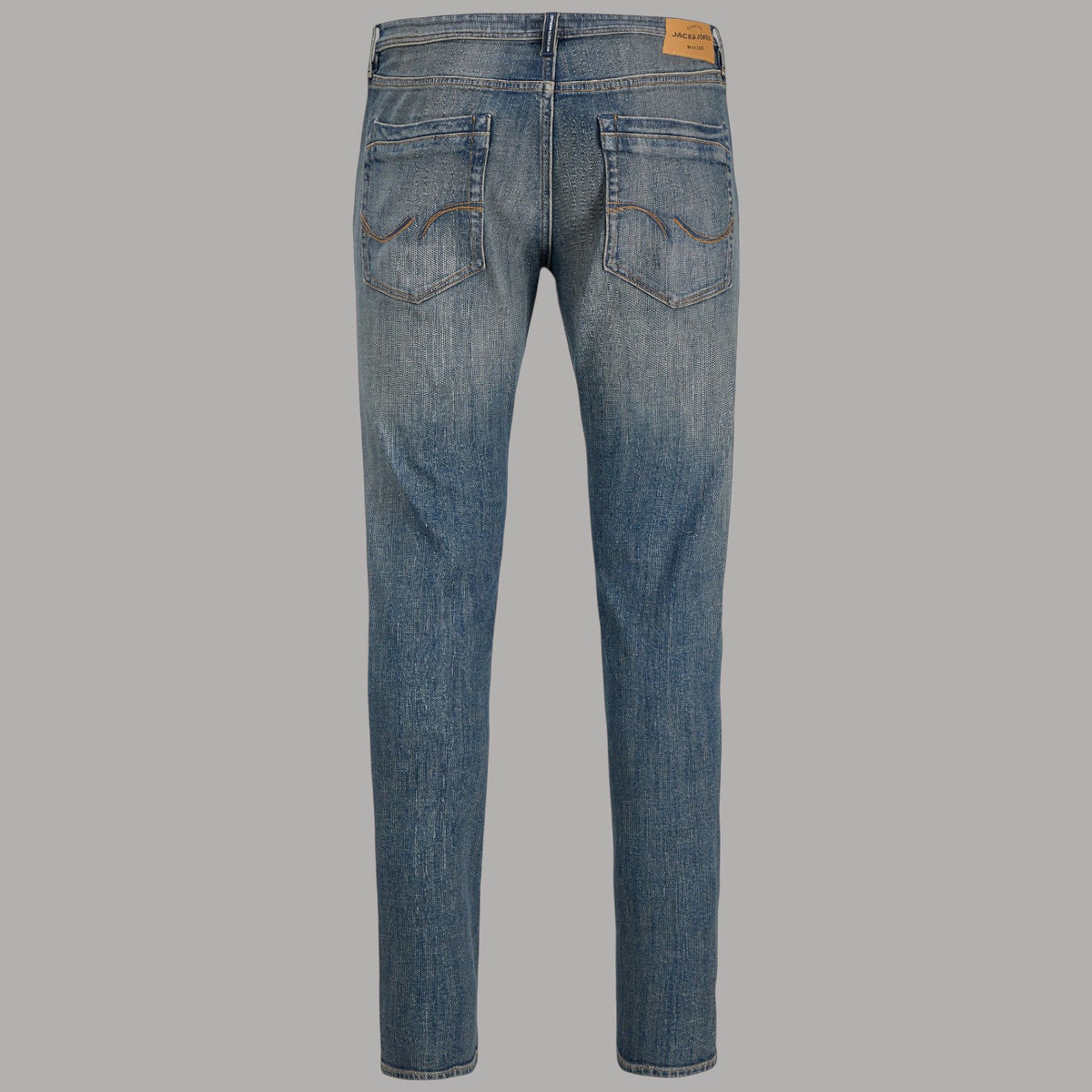 Jeans slim fit Jack & Jones Glenn blu con texture a effetto stone wash, vista laterale