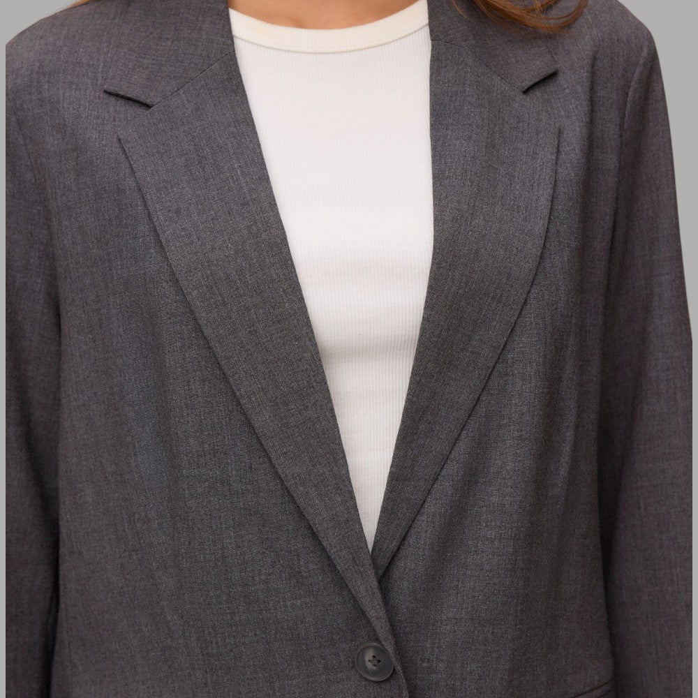Blazer Vero Moda Texas grigio con vestibilità loose fit e tasche frontali, dettaglio notched lapel
