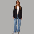 Blazer nero Vero Moda con vestibilità loose fit e tasche frontali, vista frontale