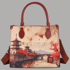 YNot Yes Bag small con stampa città e manici marroni e tracolla, dettagli visibili