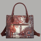 YNot Yes Bag small tote with city print in red and brown tones, handles and shoulder strap