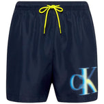 Pantaloncino da bagno blu Calvin Klein con coulisse gialla e logo CK in azzurro