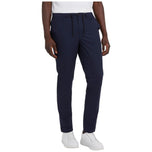 Pantaloni Guess tech stretch blu con chiusura a zip e tasche laterali