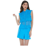 Camicia turchese senza maniche con balze a strati e bottoni frontali