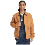 Giacca Timberland gialla con colletto e bottoni, tasche frontali e fondo elasticizzato