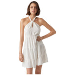 Vestito bianco halter annodato, scollo a incrocio, balze e gonna svasata